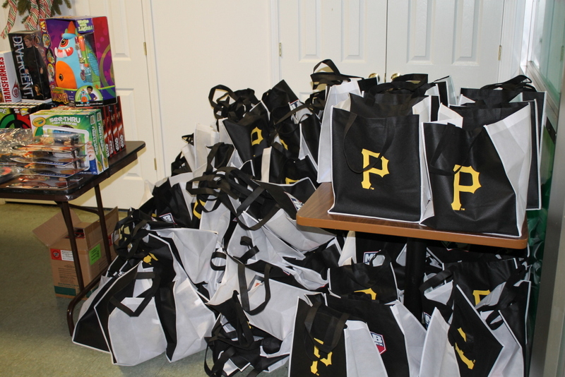 The Pittsburgh Pirates donated the over 200 treat bags. The dictionaries were placed in these bags.