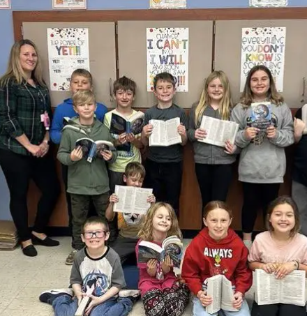 Pictured are Monongahela Rotarians Tom Graney, far left, and Deb Mangino, far right, and Kelli Schmeltz with her third-grade class at Ringgold Elementary North (Photo courtesy of the Rotary Club of Monongahela)